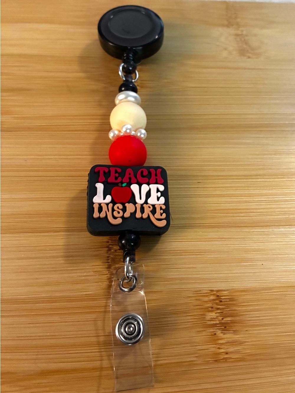 Teach Love Inspire Red & Black Badge Reel